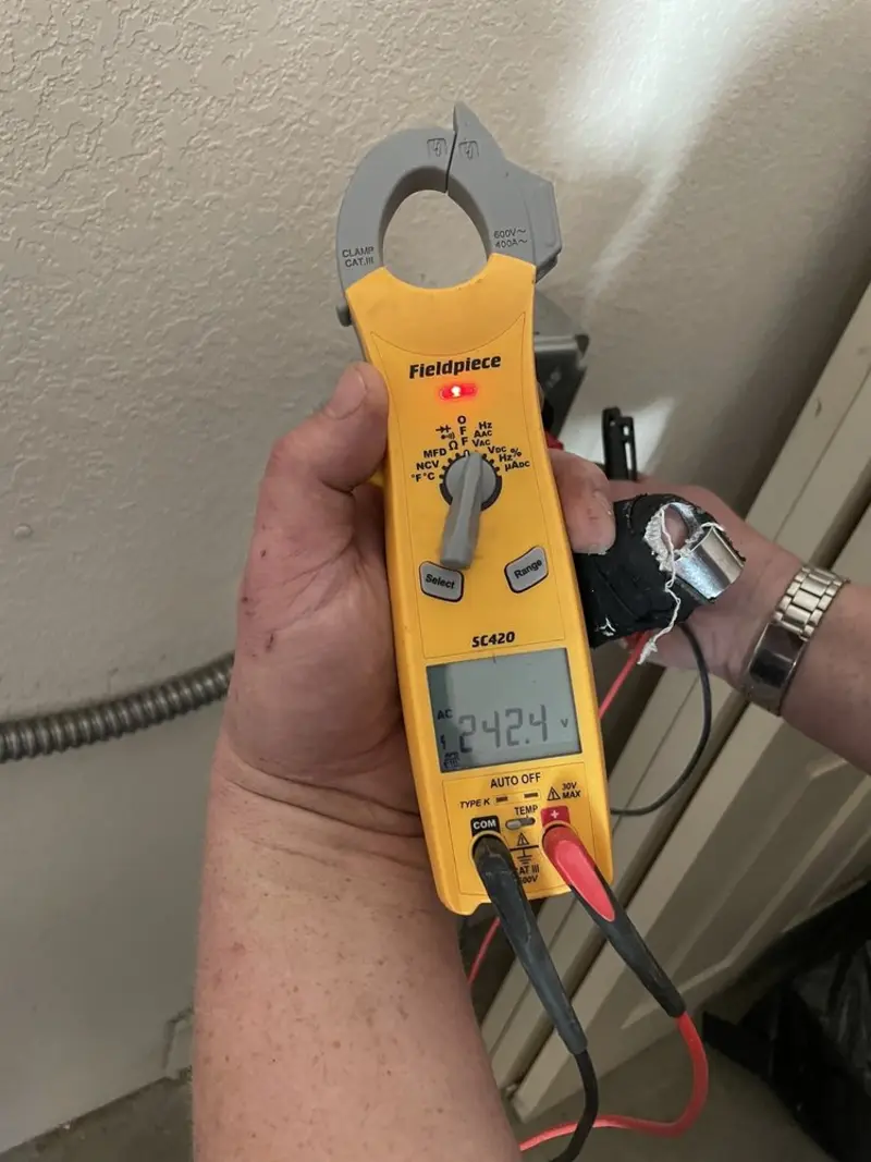 Voltage testing with clamp meter during Circuit Breaker Repair in Paloma Creek South